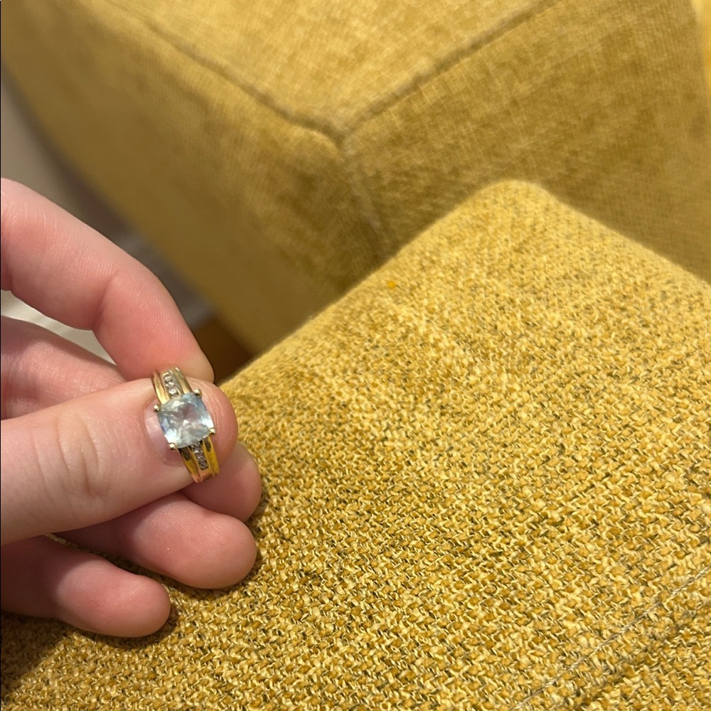 Elegant Gold and Silver Ring with Clear Gemstone